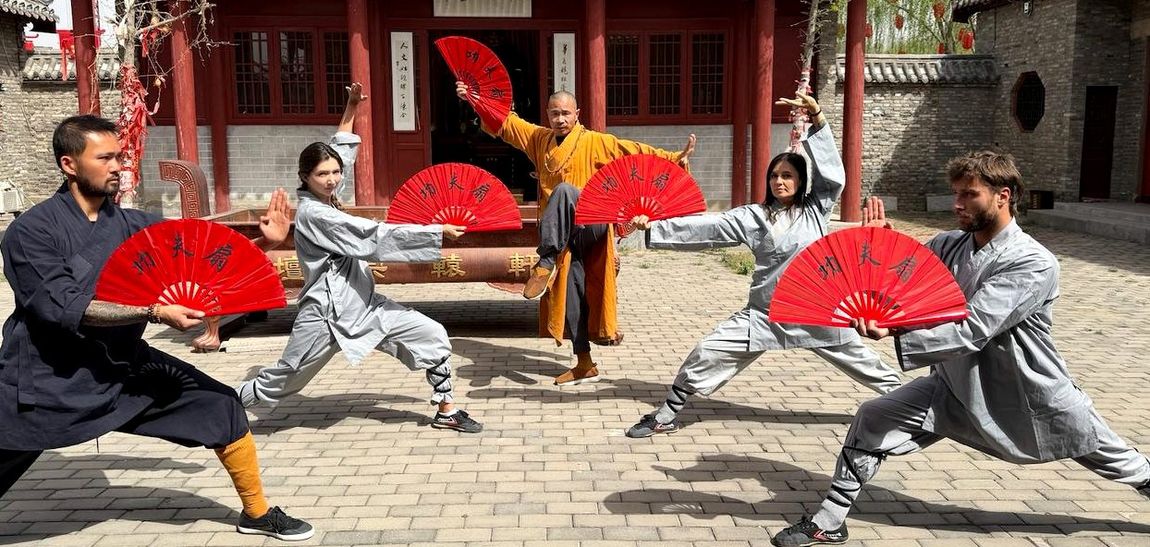 Practitioners training with the Shaolin warrior fan led by Shifu Shi Yanjun