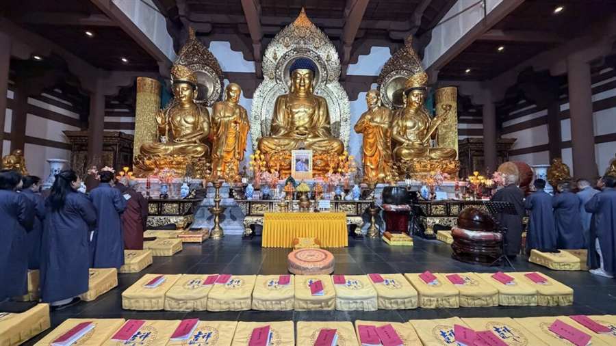 Golden Buddha statues inside the temple's main ceremony hall